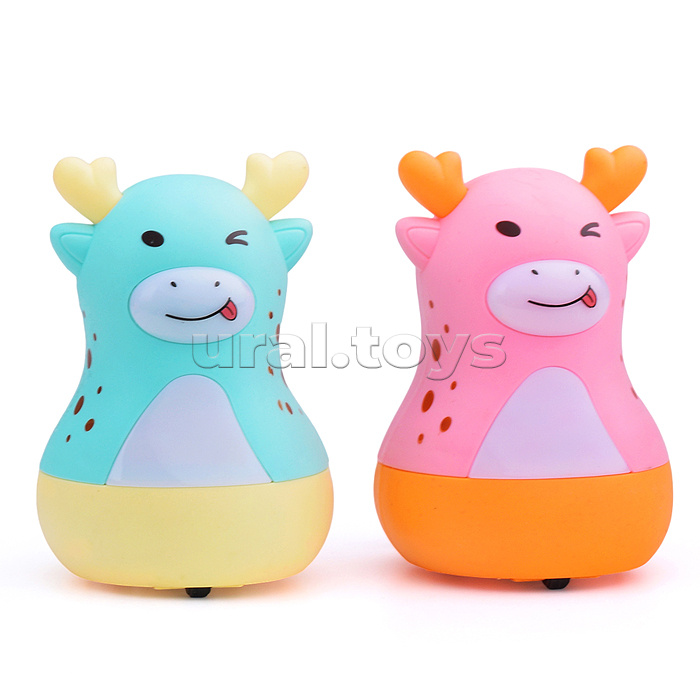 Заводная игрушка "Игривая коровка " с подсветкой, в коробке Заводная игрушка "Игривая коровка " с подсветкой, в коробке