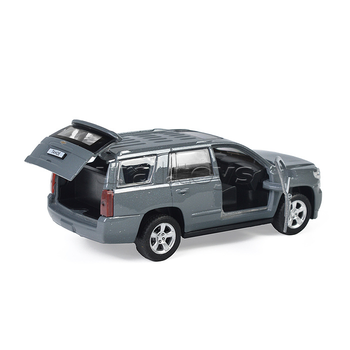 Машина металл Chevrolet Tahoe 12 см, (двери, багаж, темно серый) инерц, в коробке