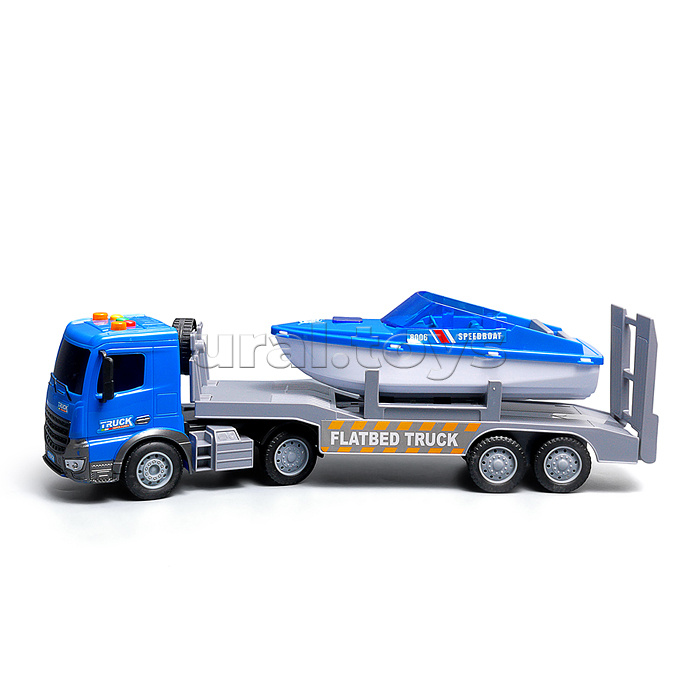 Машина "Эвакуатор" с лодкой (свет, звук) в коробке